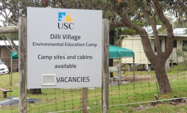 Dili Village sign