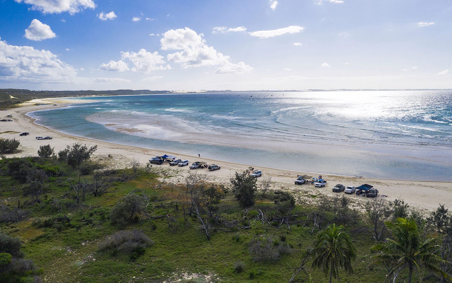 Cars parked on the beach at Waddy Point on Fraser Island